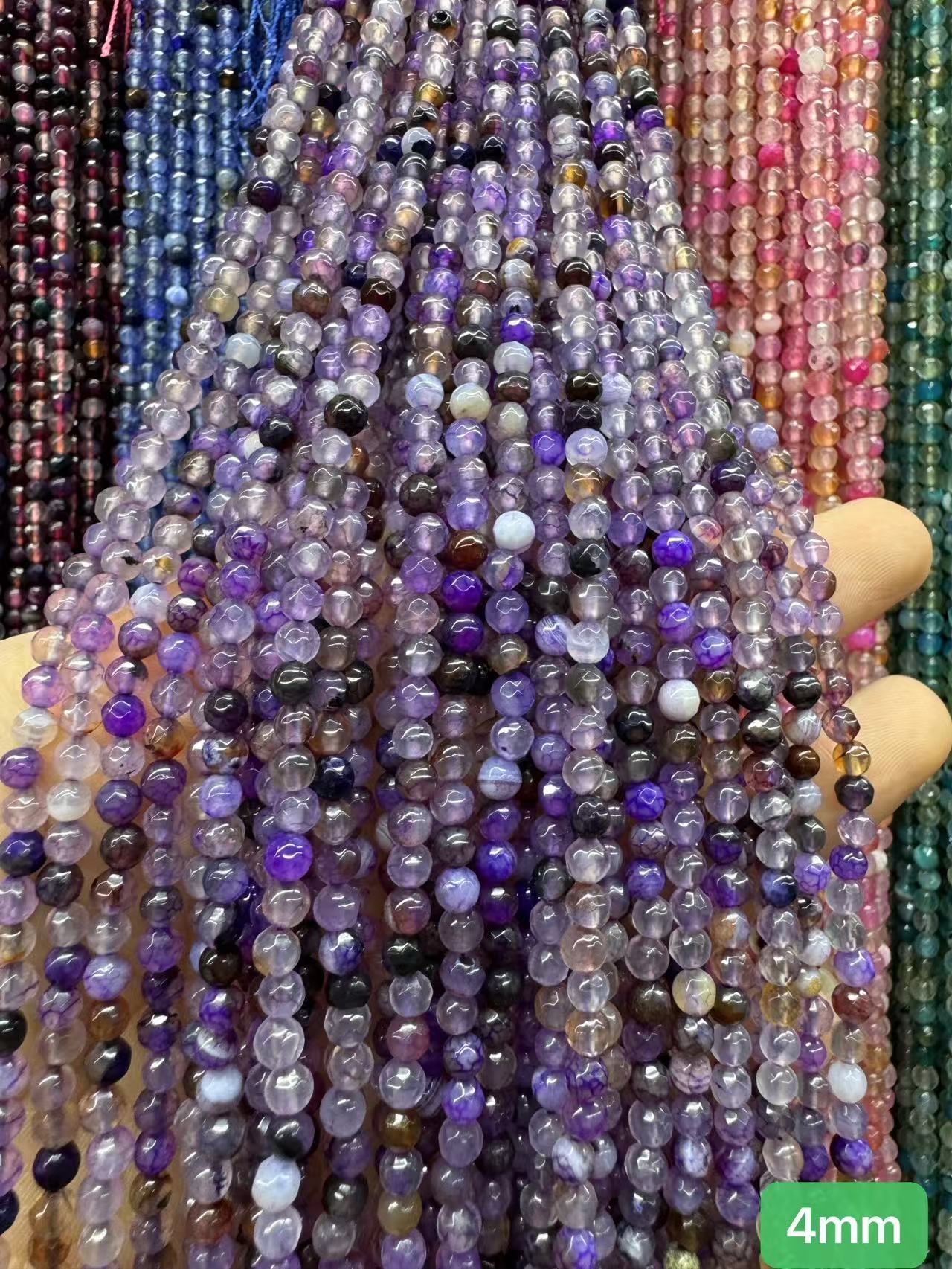 $1  4mm loose beads I