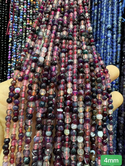 $1  4mm loose beads I