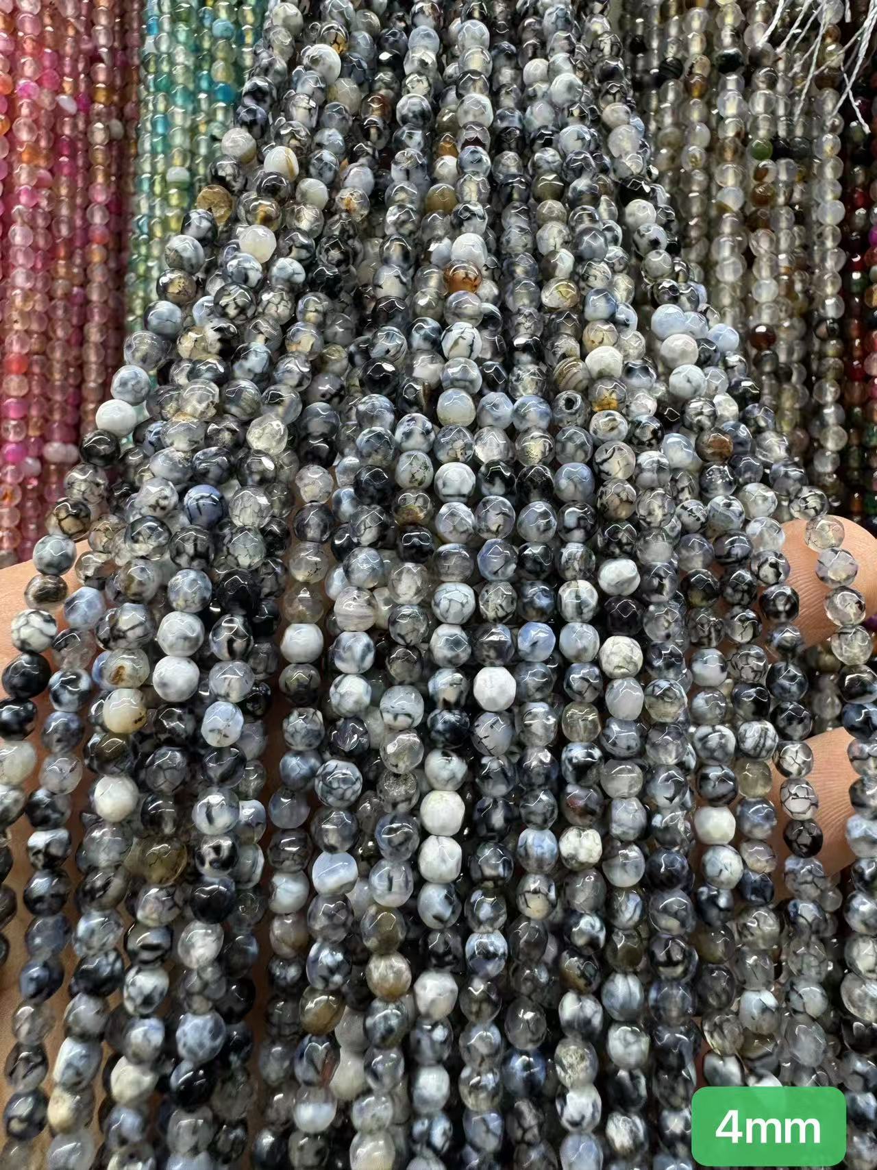 $1  4mm loose beads I