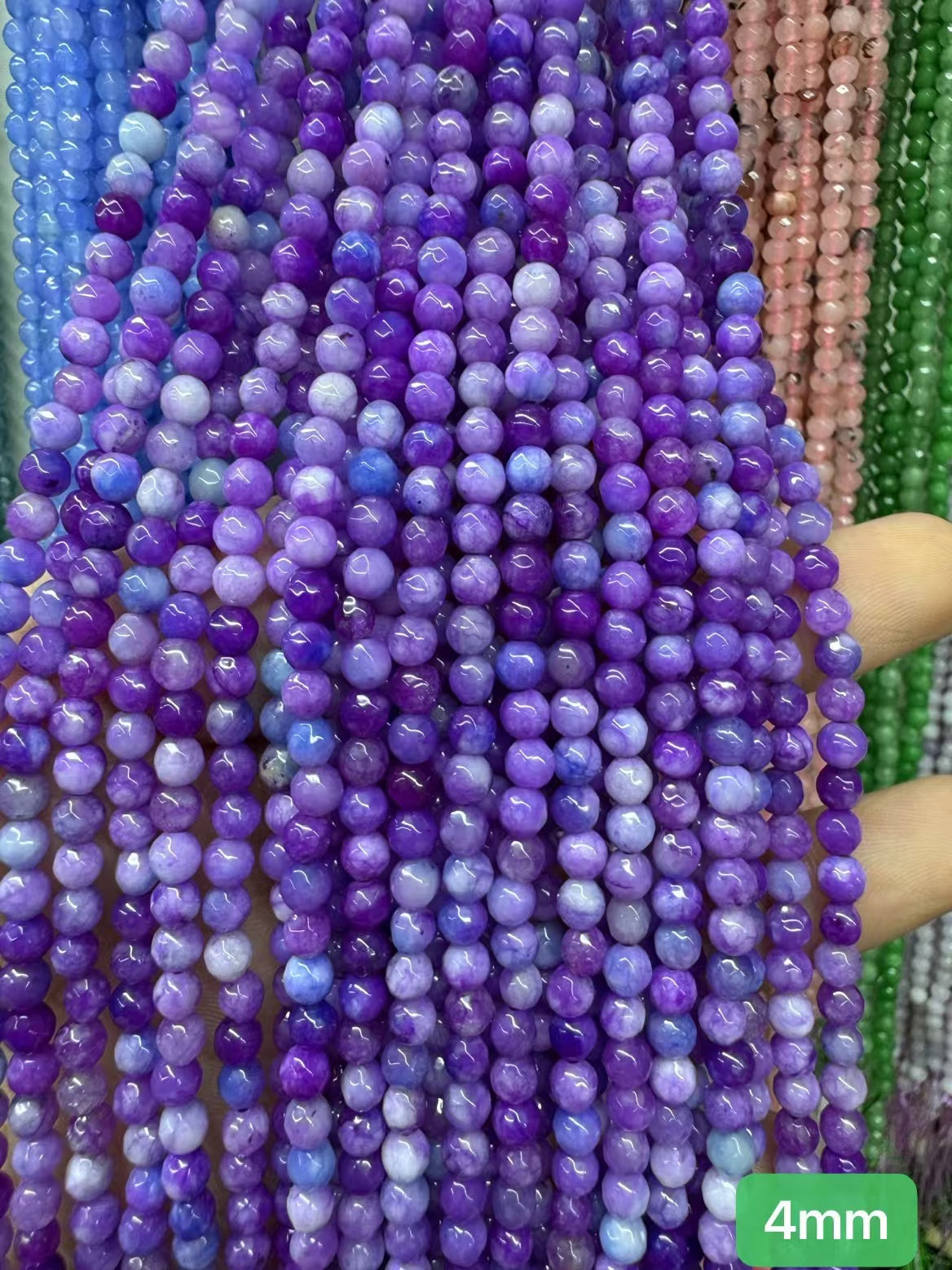 $1  4mm loose beads I