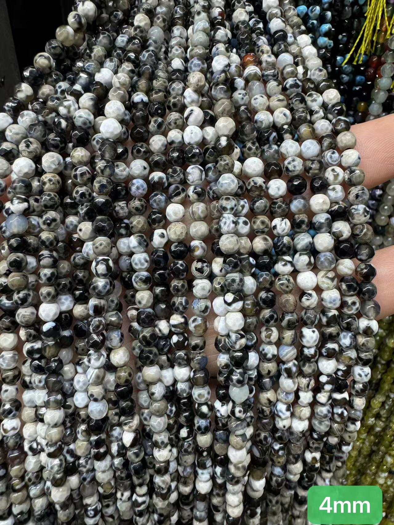 $1  4mm loose beads I