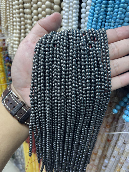 $1  4mm loose beads I