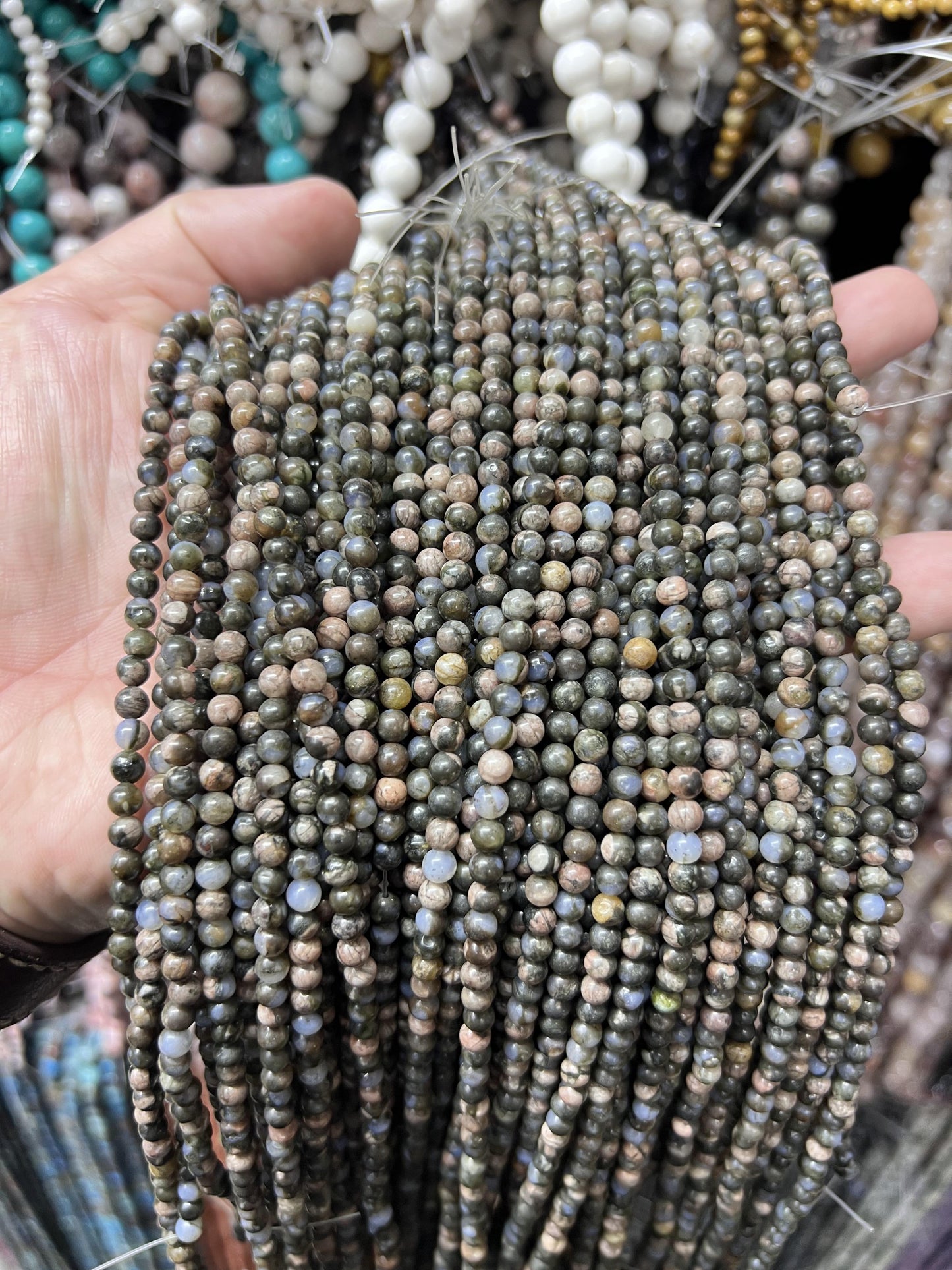 $1  4mm loose beads I