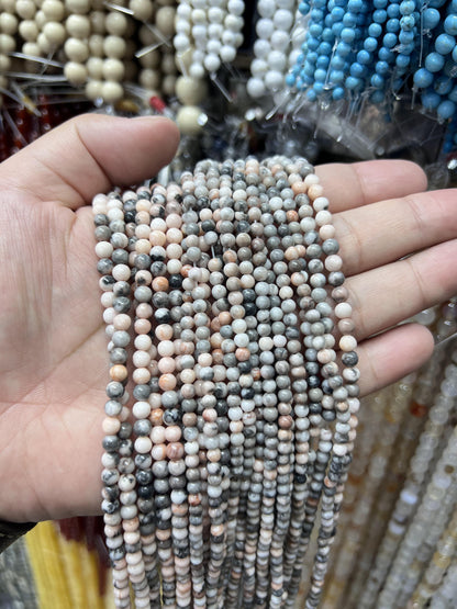 $1  4mm loose beads I