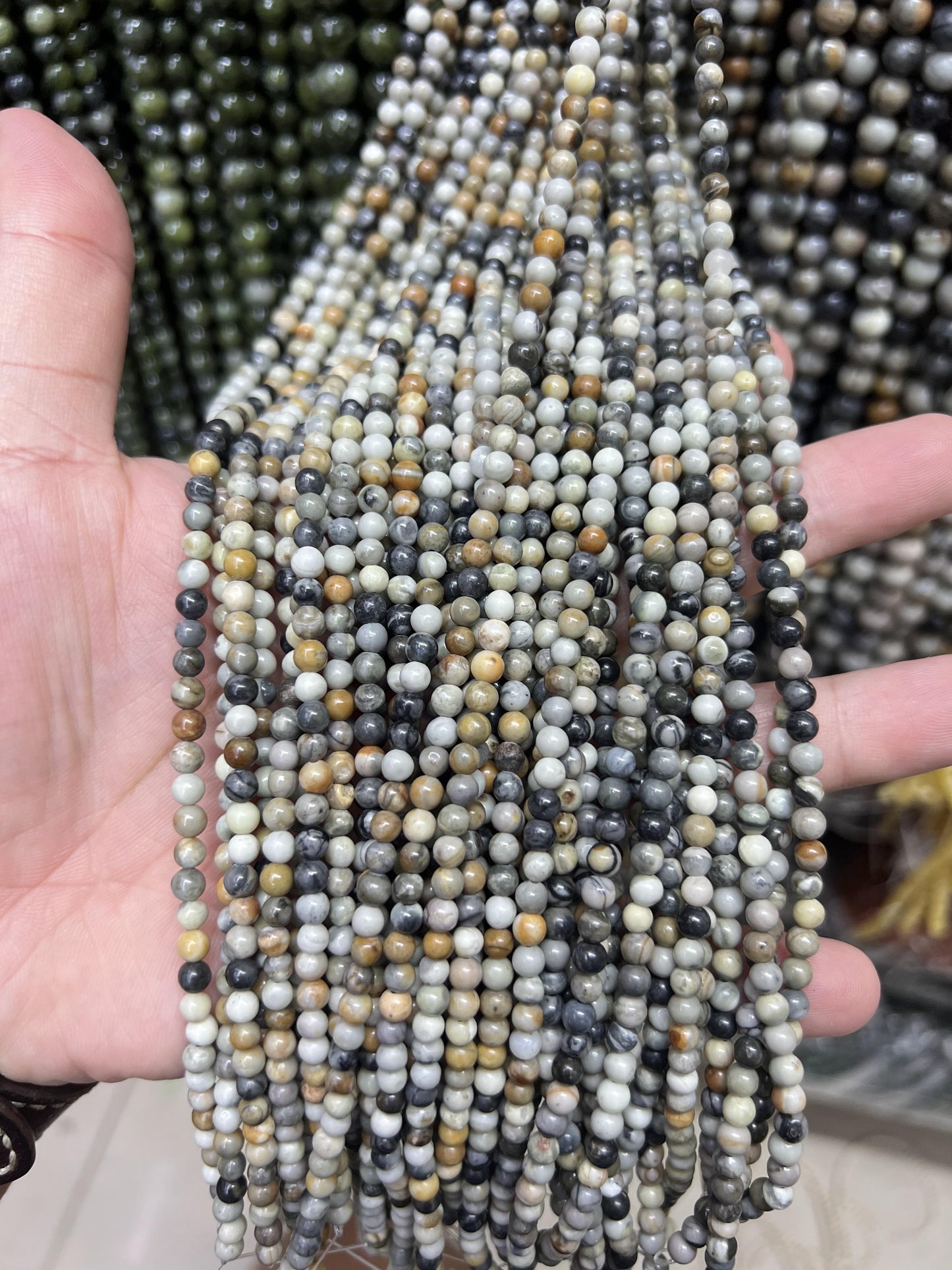 $1  4mm loose beads I