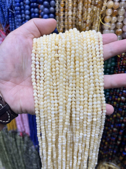 $1  4mm loose beads I