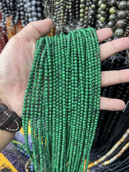 $1  4mm loose beads I