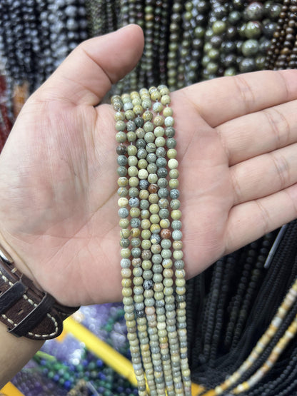 $1  4mm loose beads I