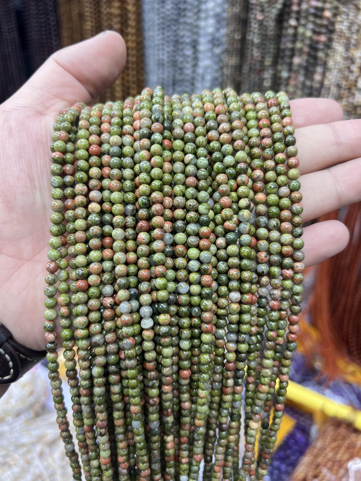 $1  4mm loose beads I