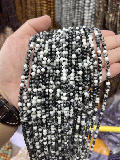 $1  4mm loose beads I