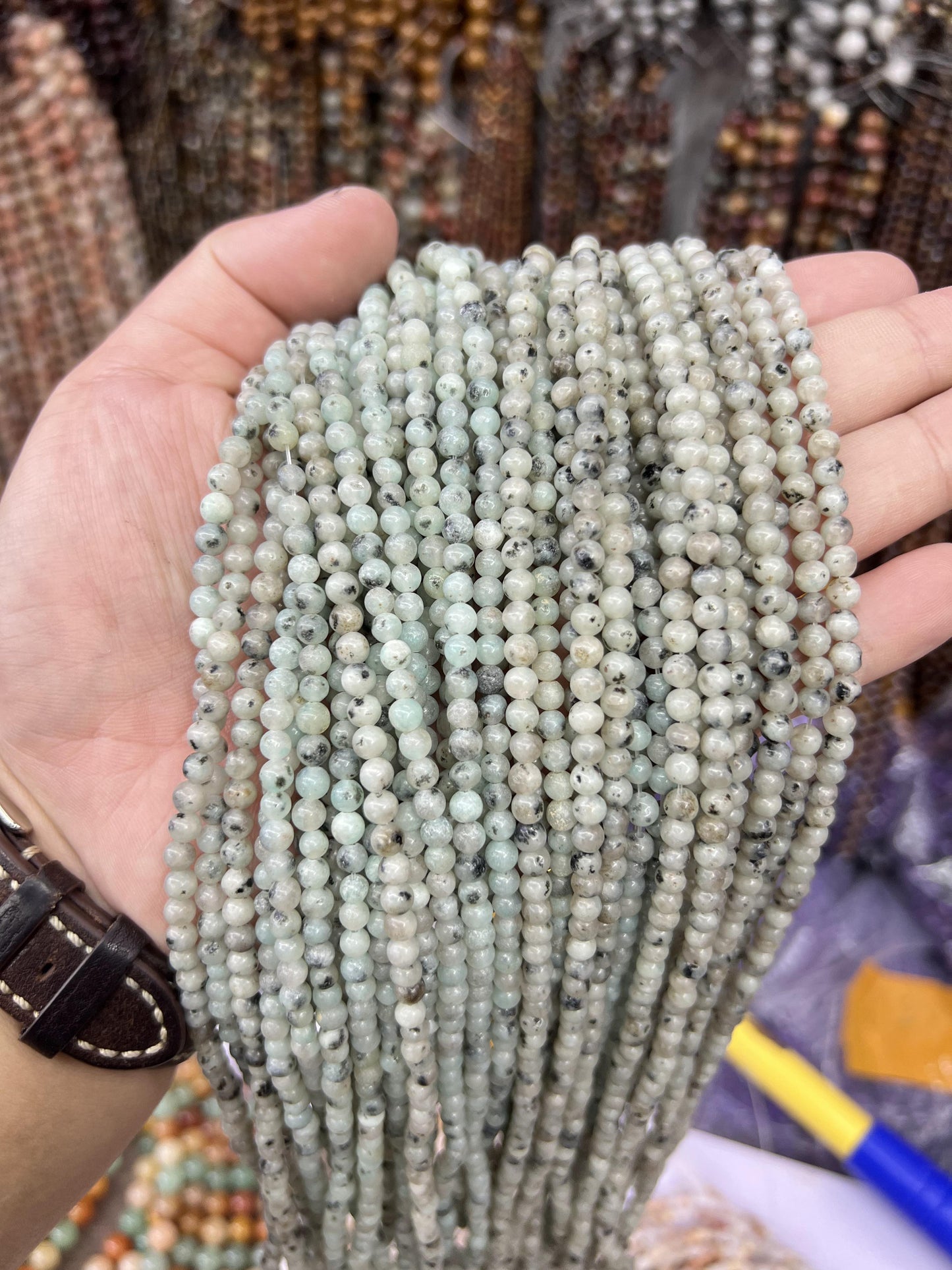 $1  4mm loose beads I