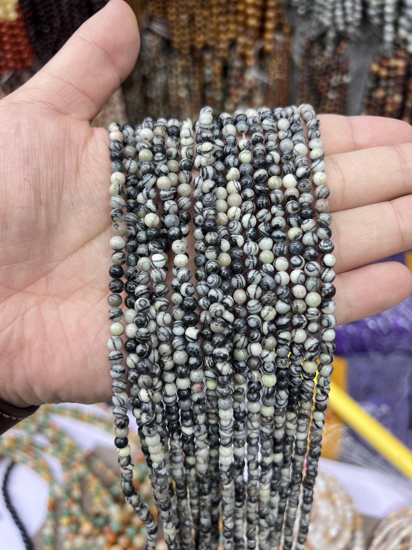 $1  4mm loose beads I