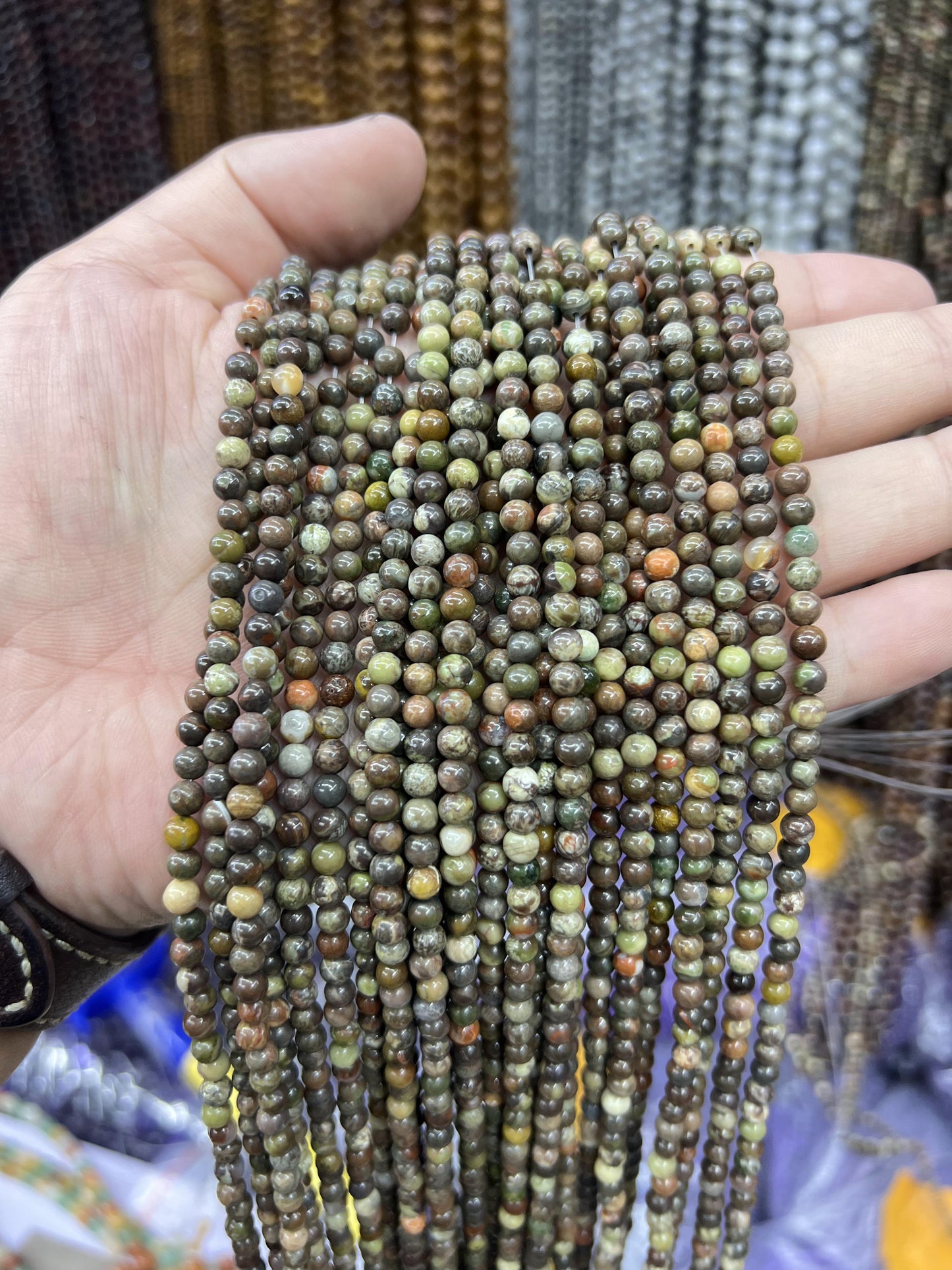 $1  4mm loose beads I