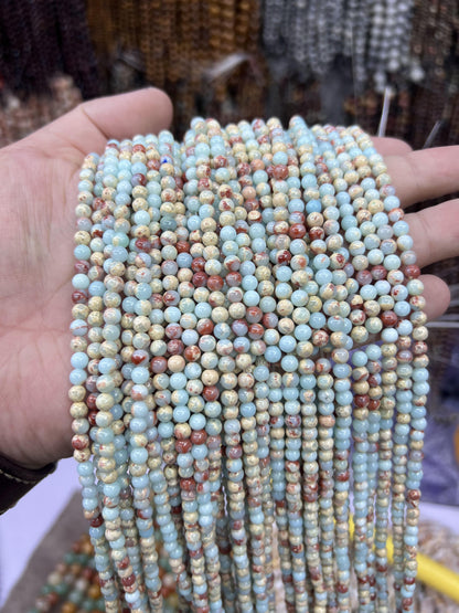 $1  4mm loose beads I