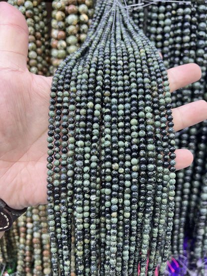 $1  4mm loose beads I