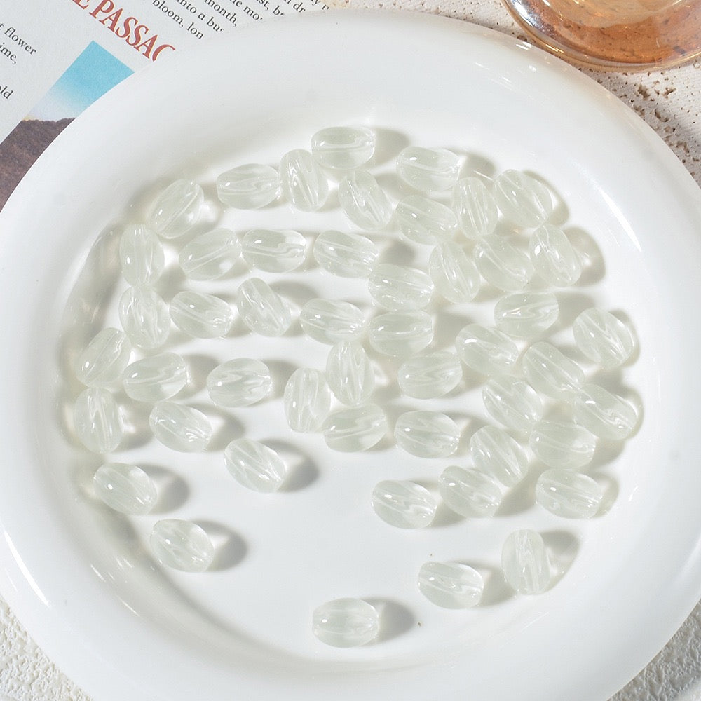 100pcs High‑Transparent Twisted Oval Glass Beads