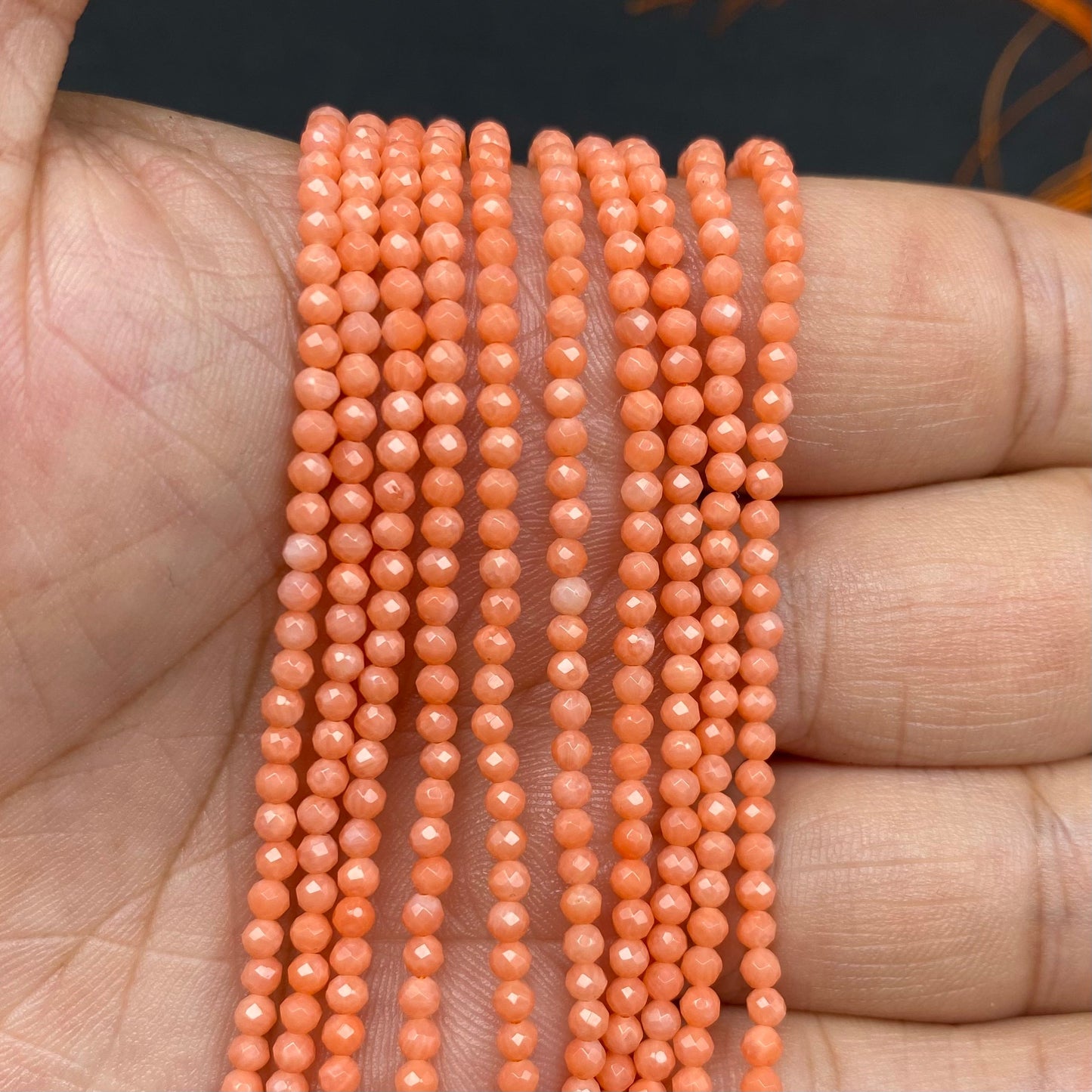 Faceted Round Coral Beads
